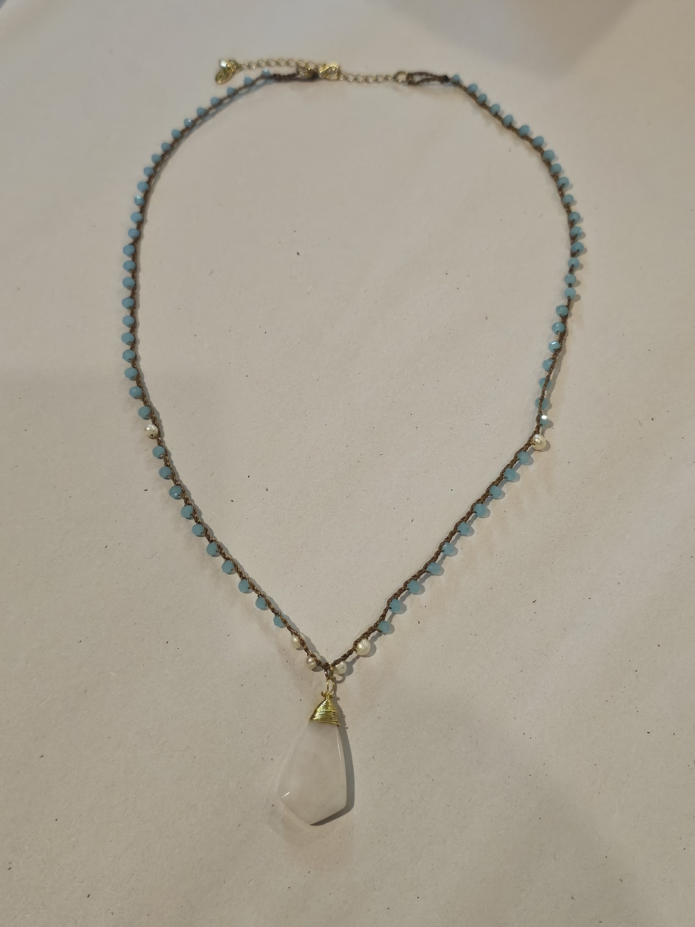 Light Blue Beaded Necklace with Clear Teardrop Pendant